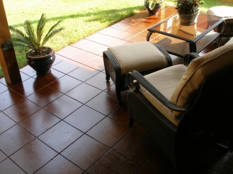 scored tiles/cola stained patio